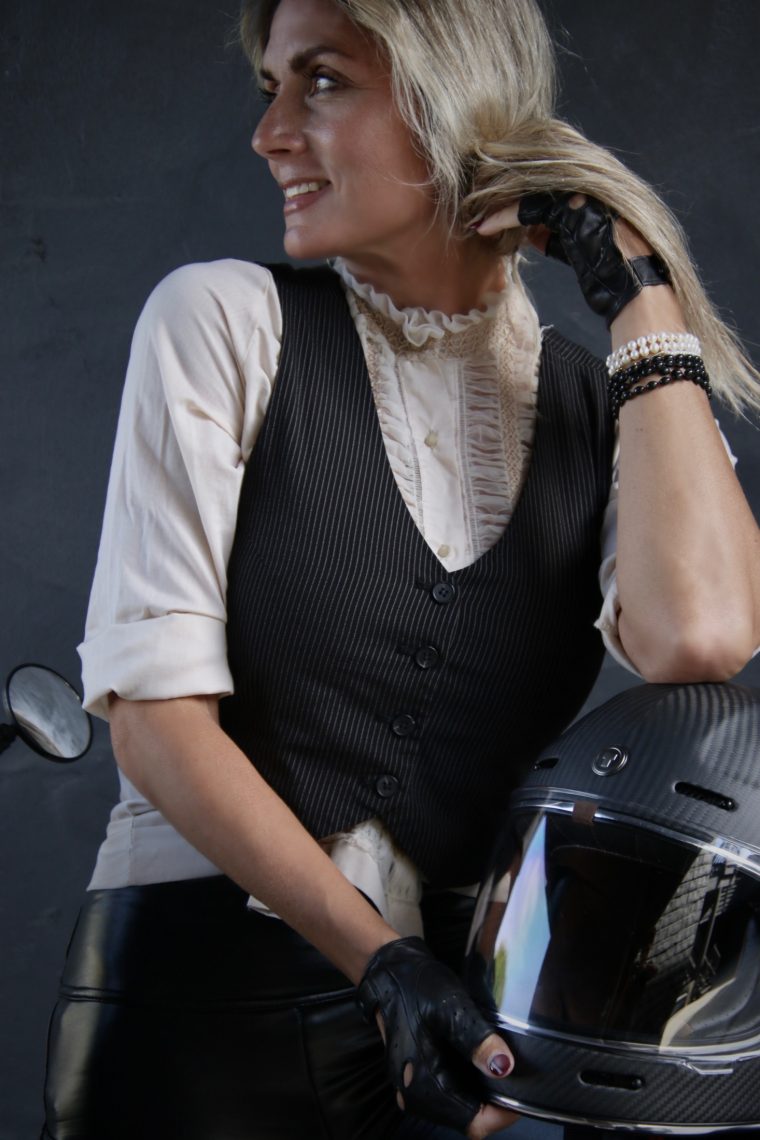 Aly in a leather vest, editorial portrait