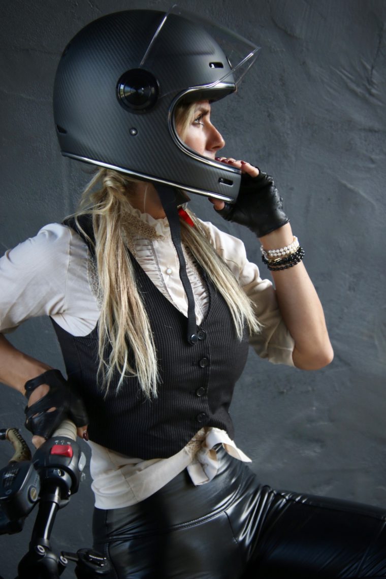 Aly holding a black Torc helmet